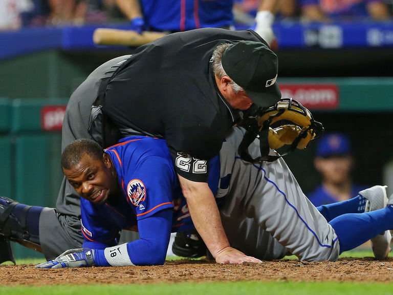 Watch Umpire Joe West accidentally falls on Mets' Davis