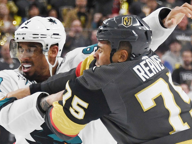 LAS VEGAS, NEVADA - APRIL 14: Evander Kane #9 of the San Jose Sharks and Ryan Reaves #75 of the Vegas Golden Knights fight in the third period of Game Three of the Western Conference First Round during the 2019 NHL Stanley Cup Playoffs at T-Mobile Arena on April 14, 2019 in Las Vegas, Nevada. The Golden Knights defeated the Sharks 6-3 to take a 2-1 lead in the series.