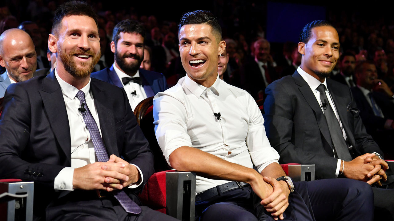 MONACO, MONACO - AUGUST 29: Cristiano Ronaldo of Juventus, Lionel Messi of FC Barcelona and Virgil Van Dijk of Liverpool react during the UEFA Champions League Draw, part of the UEFA European Club Football Season Kick-Off 2019/2020 at Salle des Princes, Grimaldi Forum on August 29, 2019 in Monaco, Monaco.