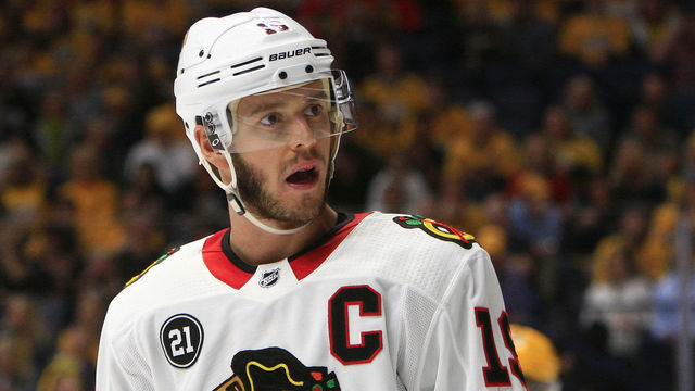 NASHVILLE, TN - APRIL 06: Chicago Blackhawks center Jonathan Toews (19) talks with a linesman during the NHL game between the Nashville Predators and Chicago Blackhawks, held on April 6, 2019, at Bridgestone Arena in Nashville, Tennessee.
