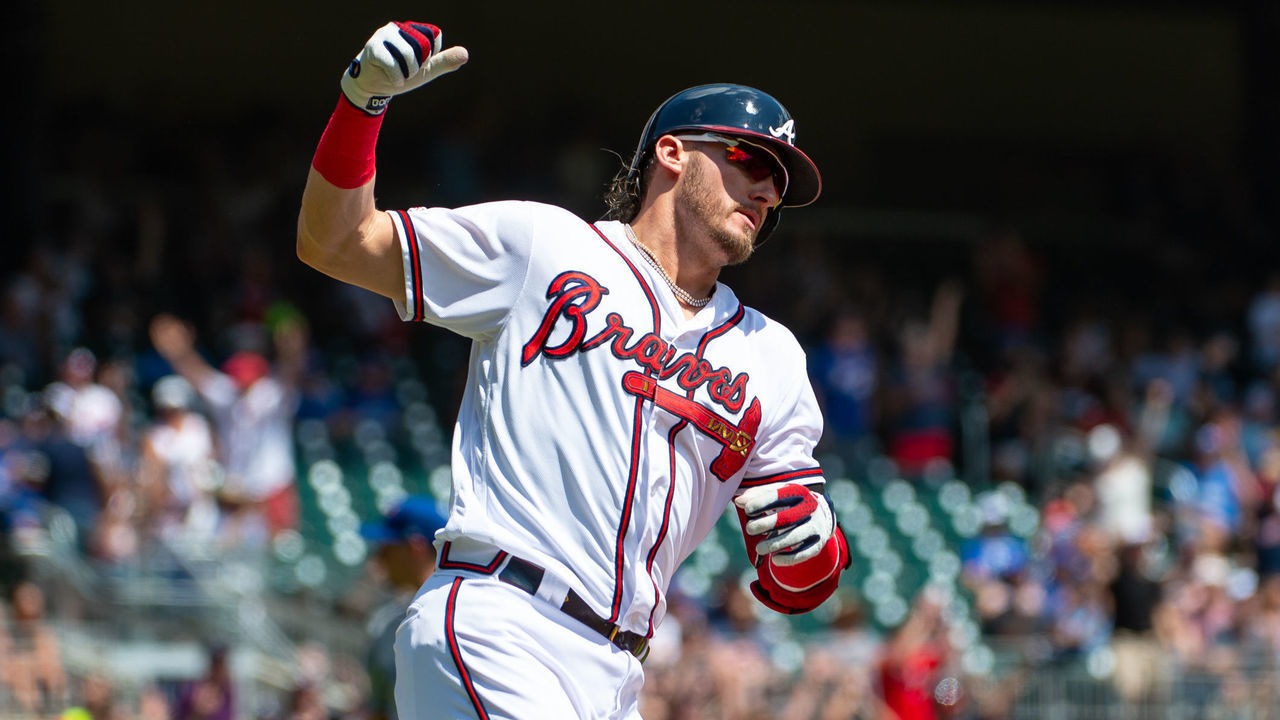 ATLANTA, GA - SEPTEMBER 02: Atlanta Braves third baseman Josh Donaldson (20) homers in the first inning carrying his umbrella during the MLB game between the Atlanta Braves and the Toronto Blue Jays on September 2, 2019 at SunTrust Park in Atlanta, Georgia.