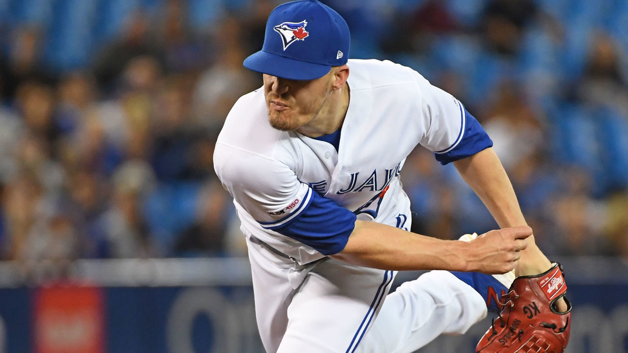 TORONTO, ON - AUGUST 27: Toronto Blue Jays Pitcher Ken Giles (51) pitches in the ninth inning during the game between the Atlanta Braves and Toronto Blue Jays on August 27, 2019 at Rogers Centre in Toronto, ON.