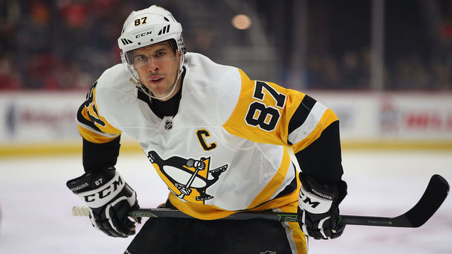 DETROIT, MICHIGAN - APRIL 02: Sidney Crosby #87 of the Pittsburgh Penguins prepares for a face off while playing the Detroit Red Wings during the first period at Little Caesars Arena on April 02, 2019 in Detroit, Michigan.