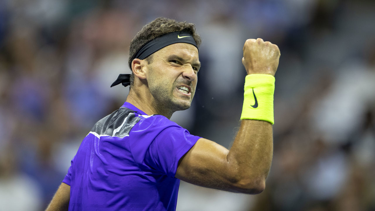 2019 US Open Tennis Tournament- Day Nine. Grigor Dimitrov of Bulgaria celebrates a break in the second set against Roger Federer of Switzerland in the Men's Singles Quarter-Finals match on Arthur Ashe Stadium during the 2019 US Open Tennis Tournament at the USTA Billie Jean King National Tennis Center on September 3rd, 2019 in Flushing, Queens, New York City.