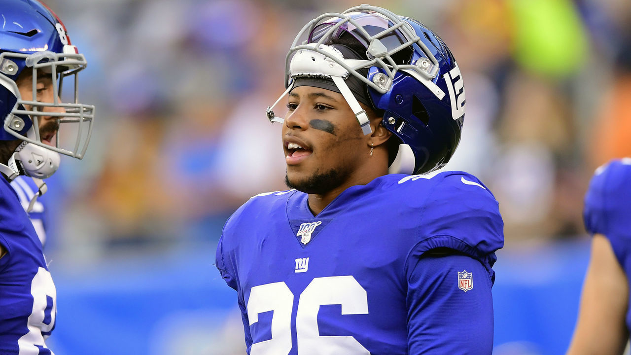 EAST RUTHERFORD, NEW JERSEY - AUGUST 16: Saquon Barkley #26 of the New York Giants warms up prior to a preseason game against the Chicago Bears at MetLife Stadium on August 16, 2019 in East Rutherford, New Jersey.