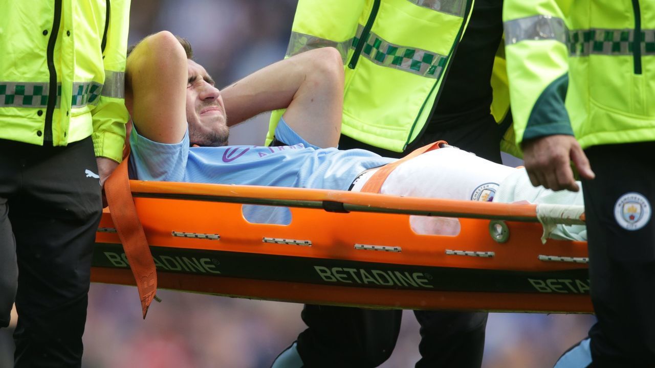 Manchester City's French defender Aymeric Laporte is taken off on a stretcher after picking up an injury during the English Premier League football match between Manchester City and Brighton and Hove Albion at the Etihad Stadium in Manchester, north west England, on August 31, 2019.