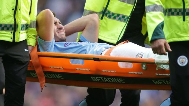 Manchester City's French defender Aymeric Laporte is taken off on a stretcher after picking up an injury during the English Premier League football match between Manchester City and Brighton and Hove Albion at the Etihad Stadium in Manchester, north west England, on August 31, 2019.