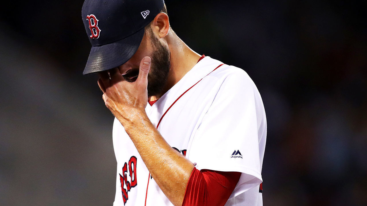 BOSTON, MASSACHUSETTS - SEPTEMBER 03: Rick Porcello #22 of the Boston Red Sox walks to the dugout after being relieved during the fifth inning against the Minnesota Twins at Fenway Park on September 03, 2019 in Boston, Massachusetts.
