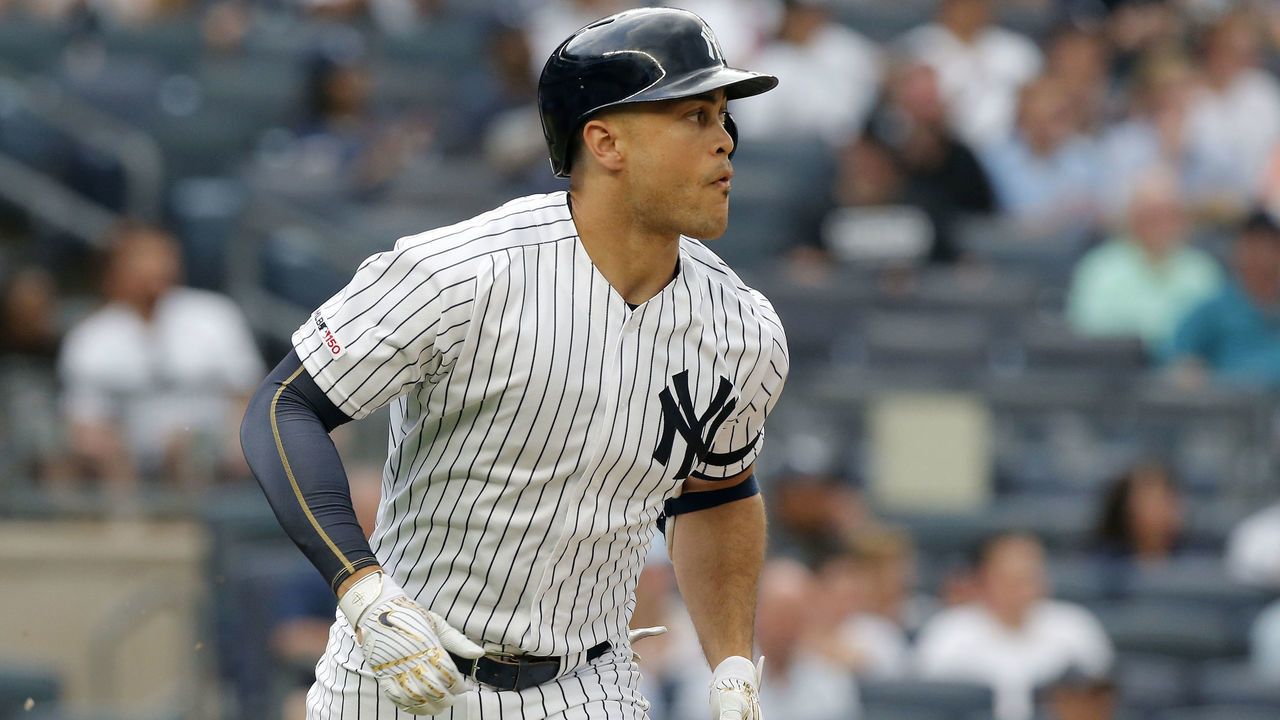 NEW YORK, NEW YORK - JUNE 25: Giancarlo Stanton #27 of the New York Yankees in action against the Toronto Blue Jays at Yankee Stadium on June 25, 2019 in New York City. The Yankees defeated the Blue Jays 4-3.