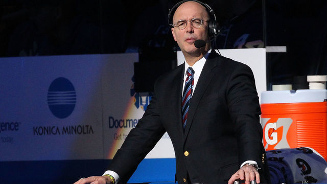 BUFFALO, NY - DECEMBER 4: Broadcaster Pierre McGuire works between the benches during an NHL game between the Buffalo Sabres and the Toronto Maple Leafs on December 4, 2018 at KeyBank Center in Buffalo, New York. Toronto won 4-3