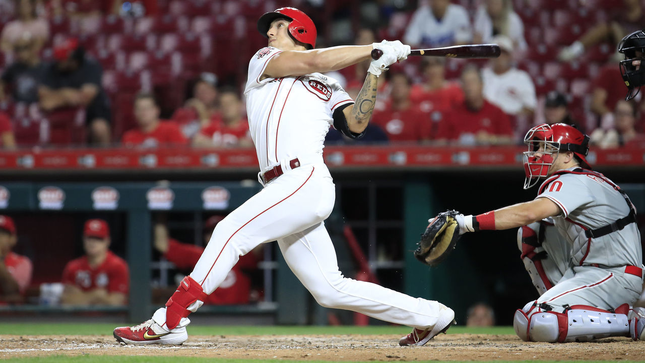 CINCINNATI, OHIO - SEPTEMBER 04: Michael Lorenzen #21 of the Cincinnati Reds hits a two run home run in the 8th inning against the Philadelphia Phillies at Great American Ball Park on September 04, 2019 in Cincinnati, Ohio.