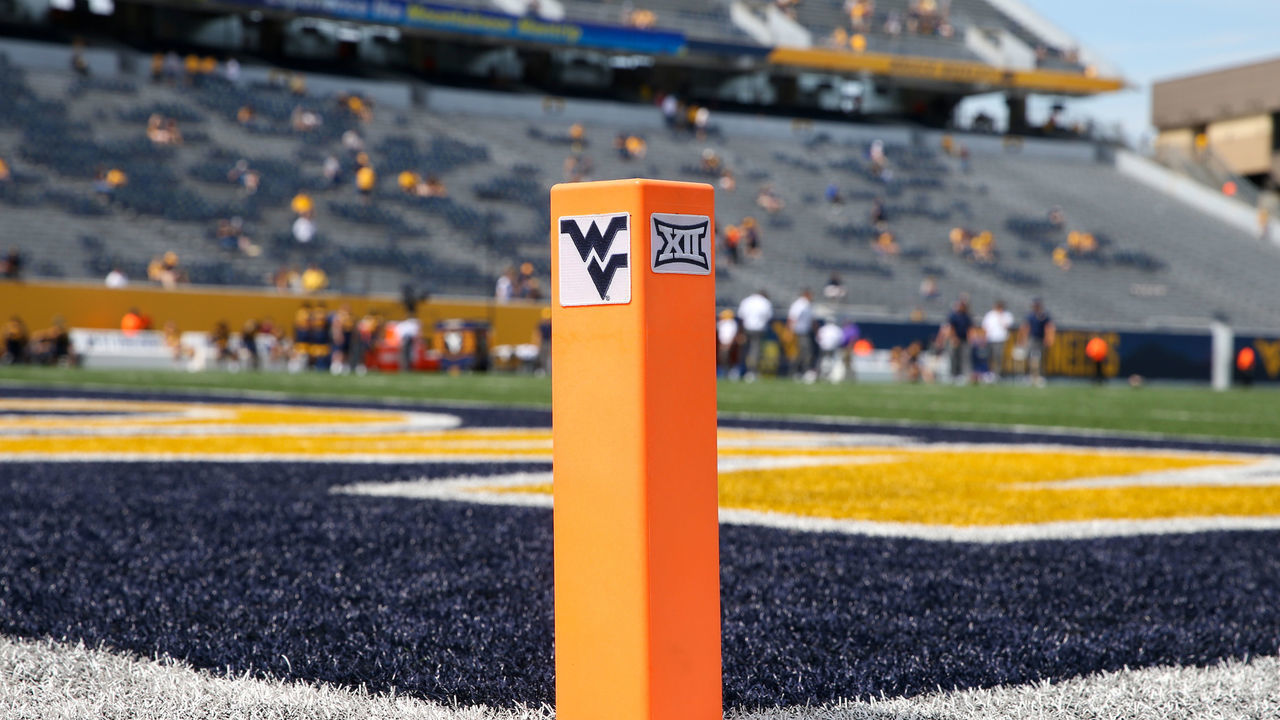 MORGANTOWN, WV - AUGUST 31: A pylon with both the Big 12 and West Virginia logos in the end zone prior to the college football game between the James Madison Dukes and the West Virginia Mountaineers on August 31, 2019, at Mountaineer Field at Milan Puskar Stadium in Morgantown, WV.