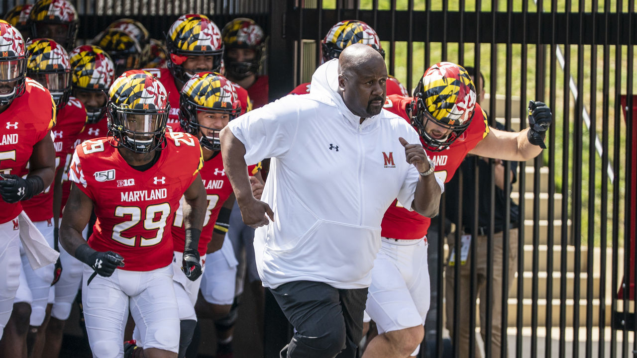 COLLEGE PARK, MD - AUGUST 31: Maryland head coach Michael Locksley leads out his team before a football game between the University of Maryland and Howard University on August 31, 2019, at Capital One Field at Maryland Stadium, in College Park, Maryland.