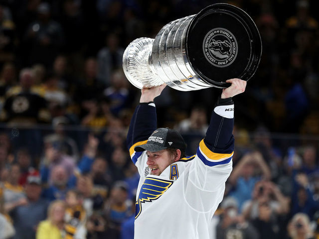 BOSTON, MASSACHUSETTS - JUNE 12: Vladimir Tarasenko #91 of the St. Louis Blues hoists the cup after defeating the Boston Bruins 4-1 to win Game Seven of the 2019 NHL Stanley Cup Final at TD Garden on June 12, 2019 in Boston, Massachusetts.