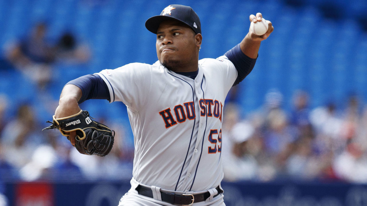 TORONTO, ONTARIO - AUGUST 31: Framber Valdez #59 of the Houston Astros pitches to the Toronto Blue Jays in the first inning during their MLB game at the Rogers Centre on August 31, 2019 in Toronto, Canada.