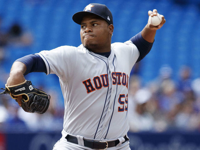 TORONTO, ONTARIO - AUGUST 31: Framber Valdez #59 of the Houston Astros pitches to the Toronto Blue Jays in the first inning during their MLB game at the Rogers Centre on August 31, 2019 in Toronto, Canada.