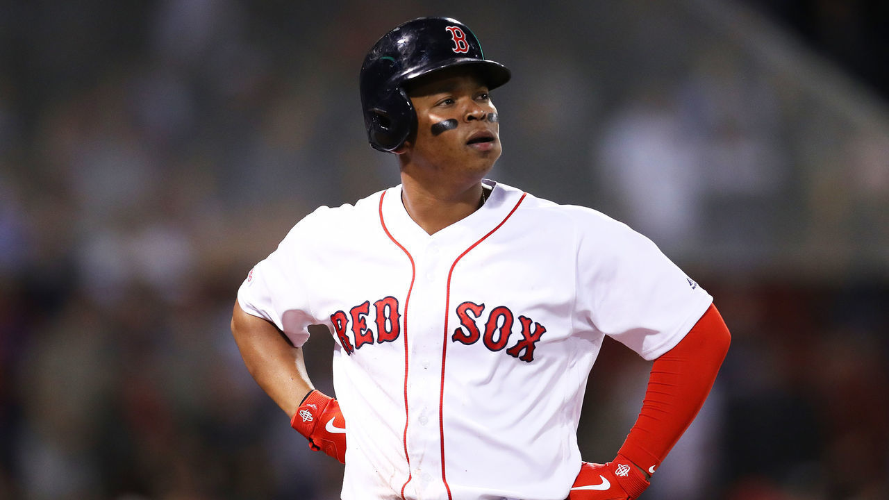 BOSTON, MASSACHUSETTS - SEPTEMBER 05: Rafael Devers #11 of the Boston Red Sox reacts after the Red Sox loss to Minnesota Twins 2-1 at Fenway Park on September 05, 2019 in Boston, Massachusetts.