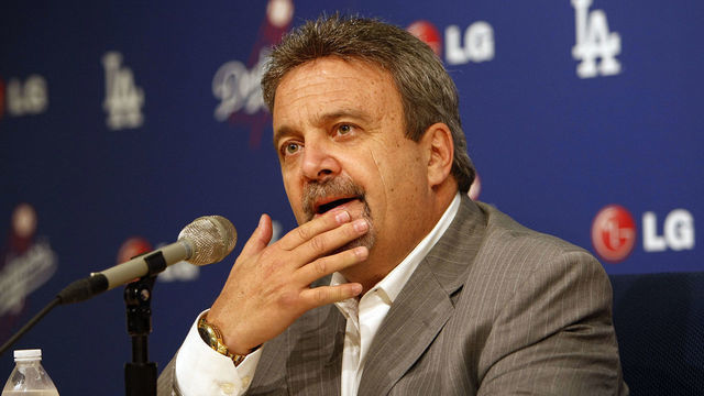 Los Angeles Dodger General Manager Ned Colletti, thinks as he spoke to the media following the Dodger 2013 season in the Dodger Stadium Interview Room on October 21, 2013.