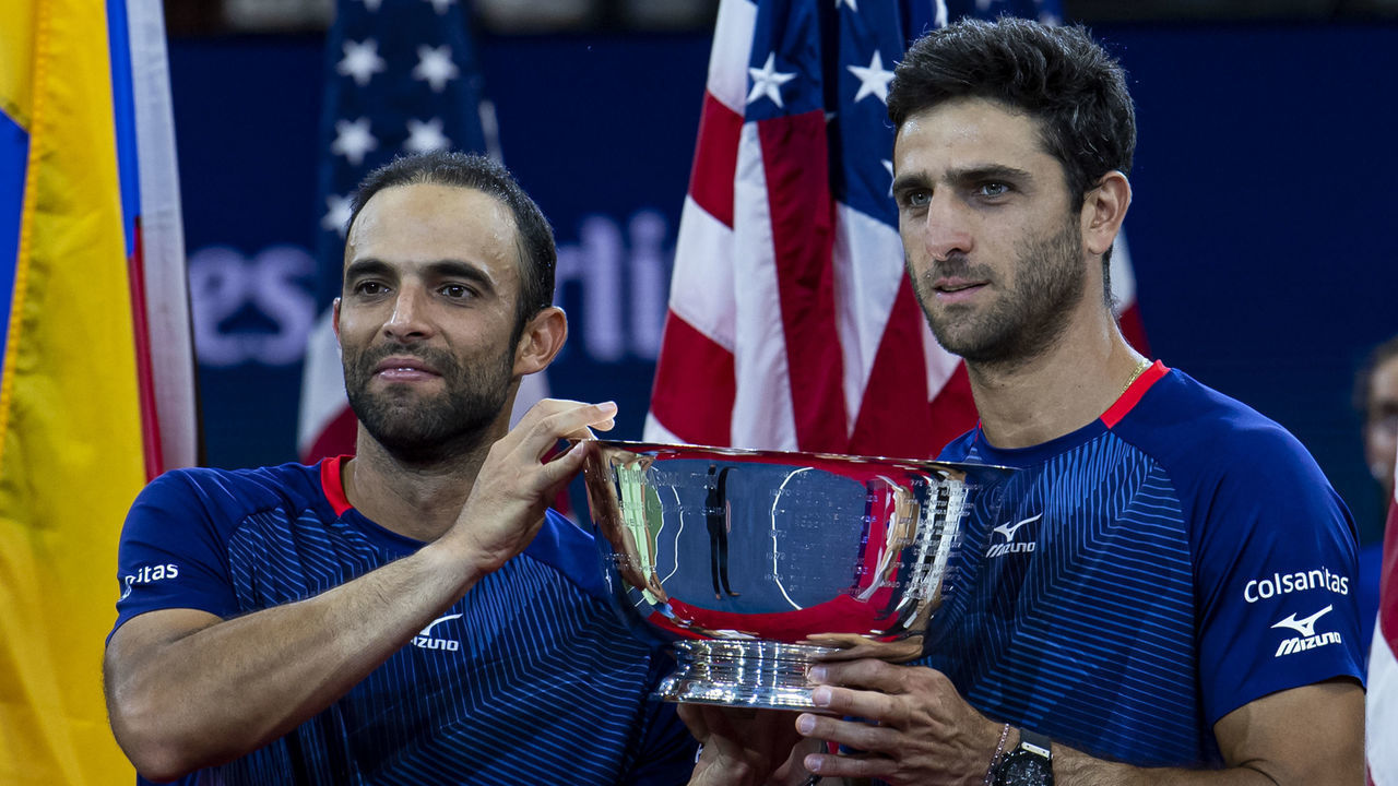 NEW YORK, NEW YORK - SEPTEMBER 06: Juan Sebastian Cabal and Robert Farah of Columbia pose with the men's doubles trophy after defeating Marcel Granollers of Spain and Horacio Zeballos of Argentina at Arthur Ashe Stadium at the USTA Billie Jean King National Tennis Center on September 06, 2019 in New York City.