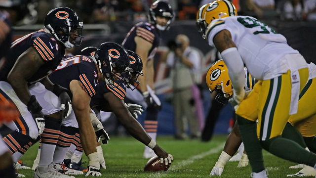 CHICAGO, ILLINOIS - SEPTEMBER 05: Members of the Chicago bears and the Green Bay Packers await the snap at Soldier Field on September 05, 2019 in Chicago, Illinois. The Packers defeated the Bears 10-3.
