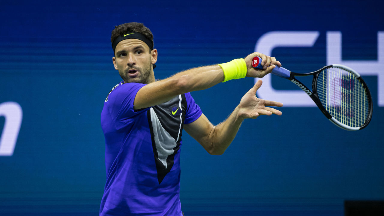 NEW YORK, NEW YORK - SEPTEMBER 06: Grigor Dimitrov of Bulgaria hits a forehand against Daniil Medvedev of Russiaat Arthur Ashe Stadium at the USTA Billie Jean King National Tennis Center on September 06, 2019 in New York City.