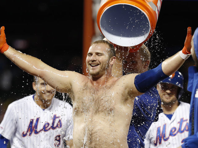 NEW YORK, NEW YORK - SEPTEMBER 06: Pete Alonso #20 of the New York Mets celebrates with teammates after defeating the Philadelphia Phillies with a walk-off walk in the ninth inning during a game at Citi Field on September 06, 2019 in New York City. The Mets defeated the Phillies 5-4.
