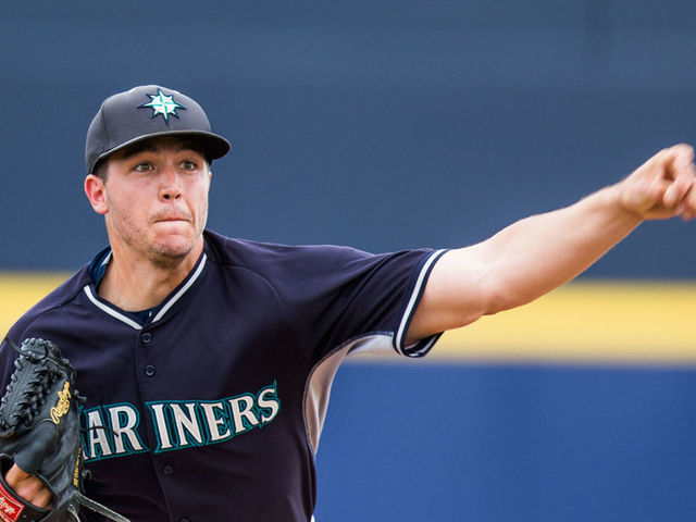 PEORIA, AZ - MARCH 11: Danny Hultzen #60 of the Seattle Mariners pitches during a spring training game against the Colorado Rockies at the Peoria Sports Complex on March 11, 2015 in Peoria, Arizona.