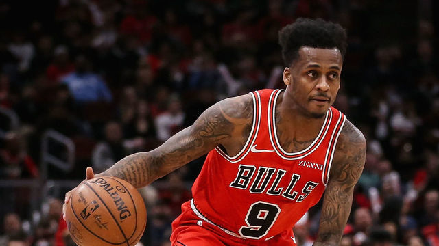 CHICAGO, ILLINOIS - MARCH 23: Antonio Blakeney #9 of the Chicago Bulls dribbles the ball in the first quarter against the Utah Jazz at the United Center on March 23, 2019 in Chicago, Illinois.