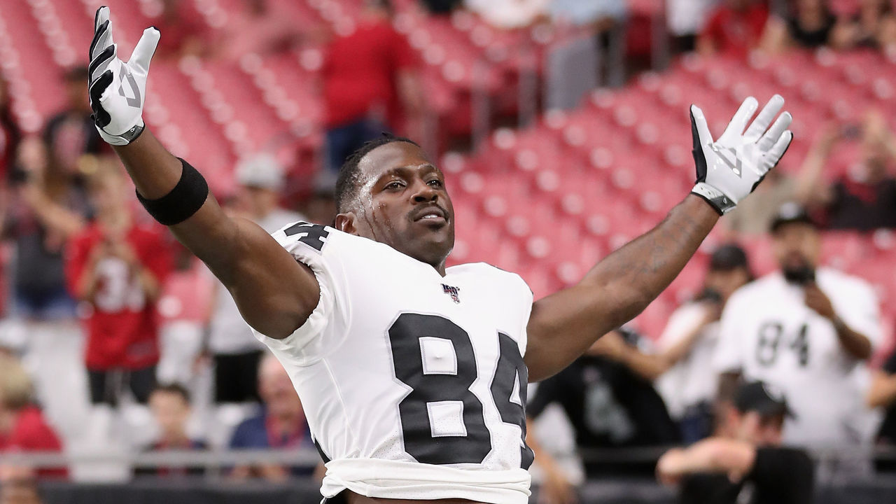 GLENDALE, ARIZONA - AUGUST 15: Wide receiver Antonio Brown #84 of the Oakland Raiders reacts to fans as he warms up before the NFL preseason game against the Arizona Cardinals at State Farm Stadium on August 15, 2019 in Glendale, Arizona.