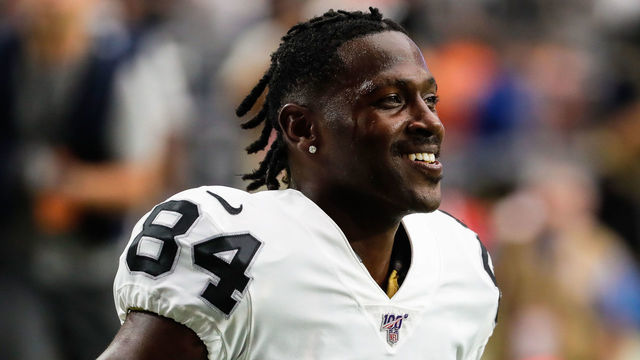 GLENDALE, AZ - AUGUST 15: Oakland Raiders wide receiver Antonio Brown (84) smiles before the NFL preseason football game between the Oakland Raiders and the Arizona Cardinals on August 15, 2019 at State Farm Stadium in Glendale, Arizona.
