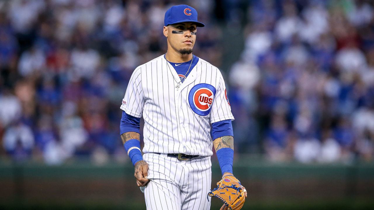 CHICAGO, ILLINOIS - AUGUST 21: Javier Baez #9 of the Chicago Cubs looks on in the first inning against the San Francisco Giants at Wrigley Field on August 21, 2019 in Chicago, Illinois.