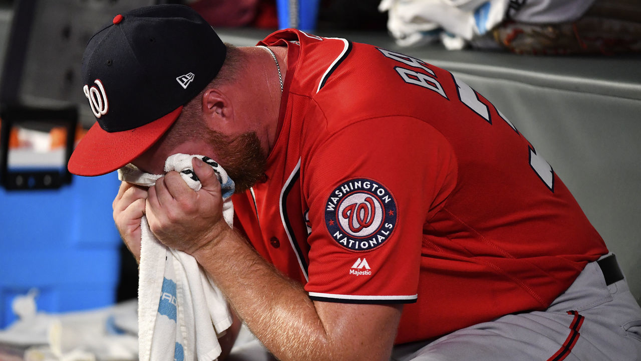 ATLANTA, GEORGIA - SEPTEMBER 07: Aaron Barrett #32 of the Washington Nationals is emotional in the dugout after pitching in the fifth inning against the Atlanta Braves at SunTrust Park on September 07, 2019 in Atlanta, Georgia.