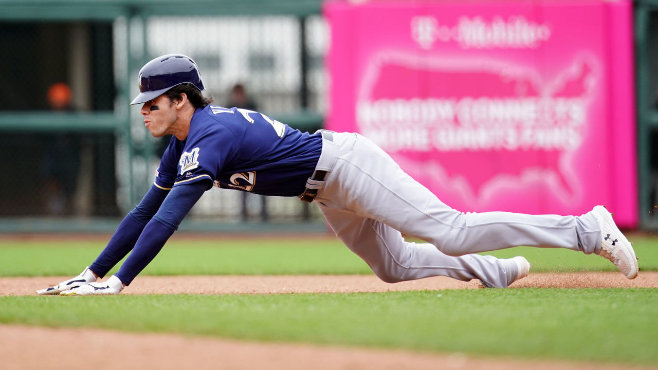 SAN FRANCISCO, CALIFORNIA - JUNE 15: Christian Yelich #22 of the Milwaukee Brewers slides into second for a stolen base during the seventh inning against the San Francisco Giants at Oracle Park on June 15, 2019 in San Francisco, California.