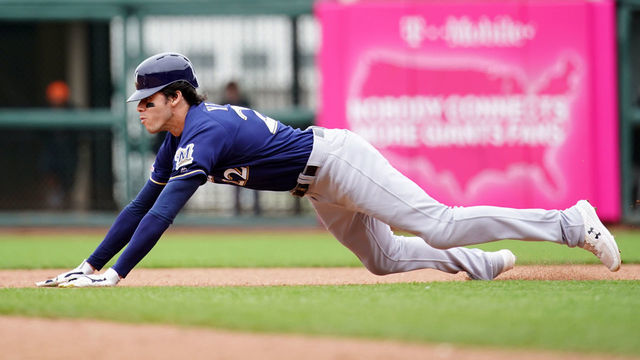 SAN FRANCISCO, CALIFORNIA - JUNE 15: Christian Yelich #22 of the Milwaukee Brewers slides into second for a stolen base during the seventh inning against the San Francisco Giants at Oracle Park on June 15, 2019 in San Francisco, California.