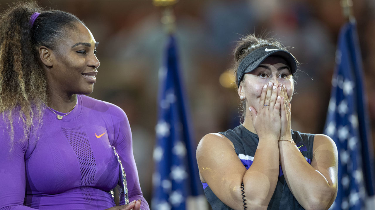 2019 US Open Tennis Tournament- Day Thirteen. Winner Bianca Andreescu of Canada reacts at the trophy presentation watched by Serena Williams of the United States after the Women's Singles Final on Arthur Ashe Stadium during the 2019 US Open Tennis Tournament at the USTA Billie Jean King National Tennis Center on September 7th, 2019 in Flushing, Queens, New York City.