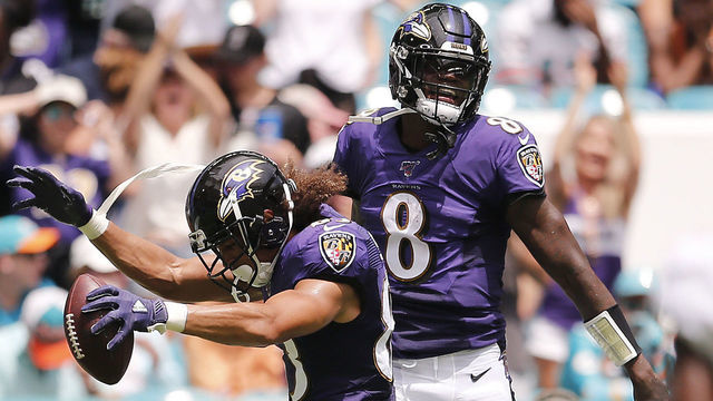 MIAMI, FLORIDA - SEPTEMBER 08: Willie Snead #83 of the Baltimore Ravens celebrates with Lamar Jackson #8 after scoring a touchdown against the Miami Dolphins during the second quarter at Hard Rock Stadium on September 08, 2019 in Miami, Florida.
