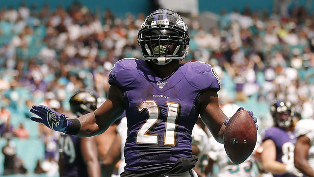 MIAMI, FLORIDA - SEPTEMBER 08: Mark Ingram #21 of the Baltimore Ravens celebrates after scoring a touchdown against the Miami Dolphins during the second quarter at Hard Rock Stadium on September 08, 2019 in Miami, Florida.