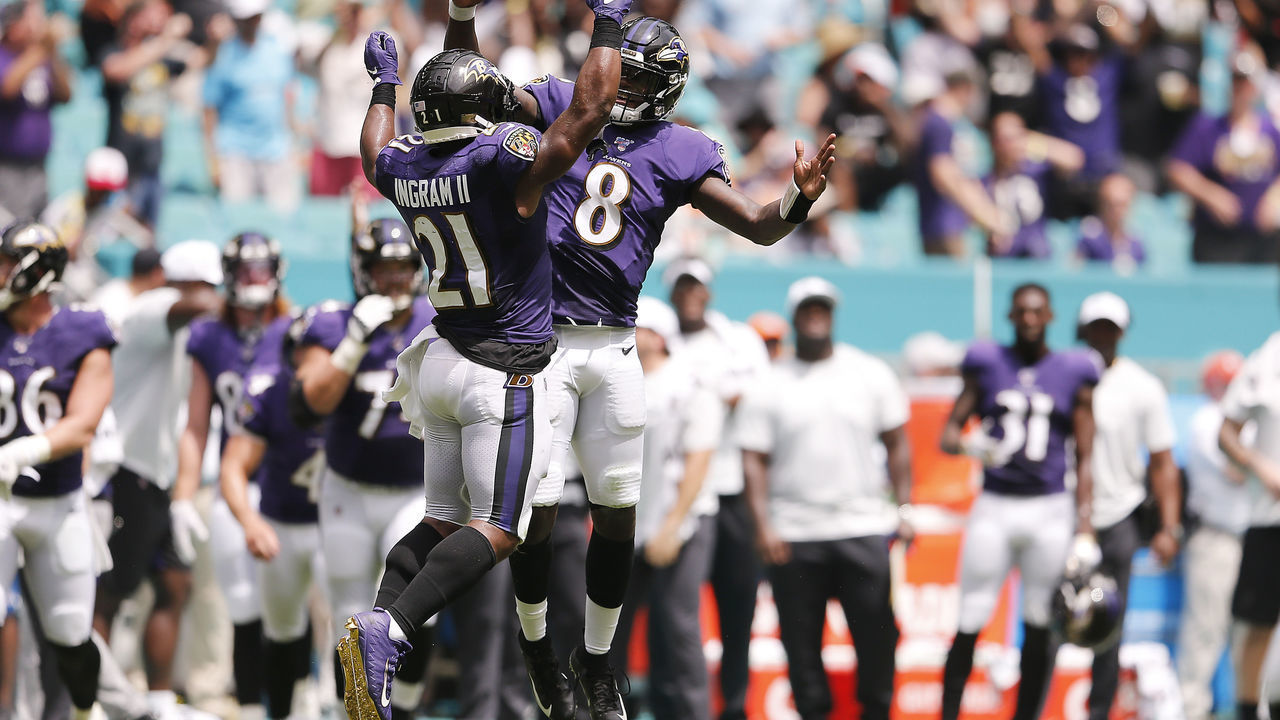 MIAMI, FLORIDA - SEPTEMBER 08: Lamar Jackson #8 of the Baltimore Ravens celebrates with Mark Ingram #21 after a touchdown against the Miami Dolphins during the second quarter at Hard Rock Stadium on September 08, 2019 in Miami, Florida.