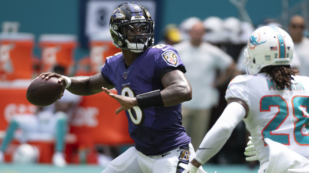 MIAMI GARDENS, FL - SEPTEMBER 08: Baltimore Ravens quarterback Lamar Jackson (8) throws the ball under pressure from Miami Dolphins cornerback Bobby McCain (28) during the NFL game between the Baltimore Ravens and the Miami Dolphins at the Hard Rock Stadium in Miami Gardens, Florida on September 8, 2019.