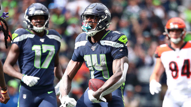 SEATTLE, WASHINGTON - SEPTEMBER 08: D.K. Metcalf #14 of the Seattle Seahawks celebrates after making a catch in the third quarter against the Cincinnati Bengals during their game at CenturyLink Field on September 08, 2019 in Seattle, Washington.