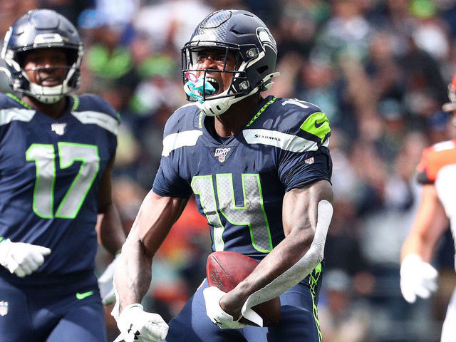 SEATTLE, WASHINGTON - SEPTEMBER 08: D.K. Metcalf #14 of the Seattle Seahawks celebrates after making a catch in the third quarter against the Cincinnati Bengals during their game at CenturyLink Field on September 08, 2019 in Seattle, Washington.