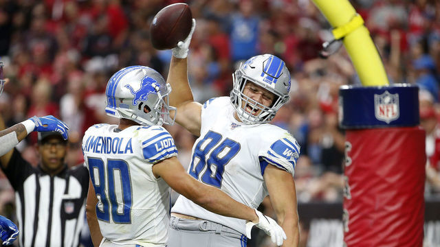 GLENDALE, ARIZONA - SEPTEMBER 08: Tight end T.J. Hockenson #88 of the Detroit Lions celebrates his touchdown catch against the Arizona Cardinals with teammate Danny Amendola #80 during the second half of the NFL football game at State Farm Stadium on September 08, 2019 in Glendale, Arizona.