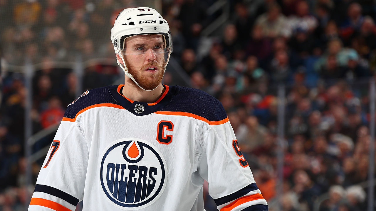 BUFFALO, NY - MARCH 4: Connor McDavid #97 of the Edmonton Oilers prepares for a faceoff during an NHL game against the Buffalo Sabres on March 4, 2019 at KeyBank Center in Buffalo, New York.