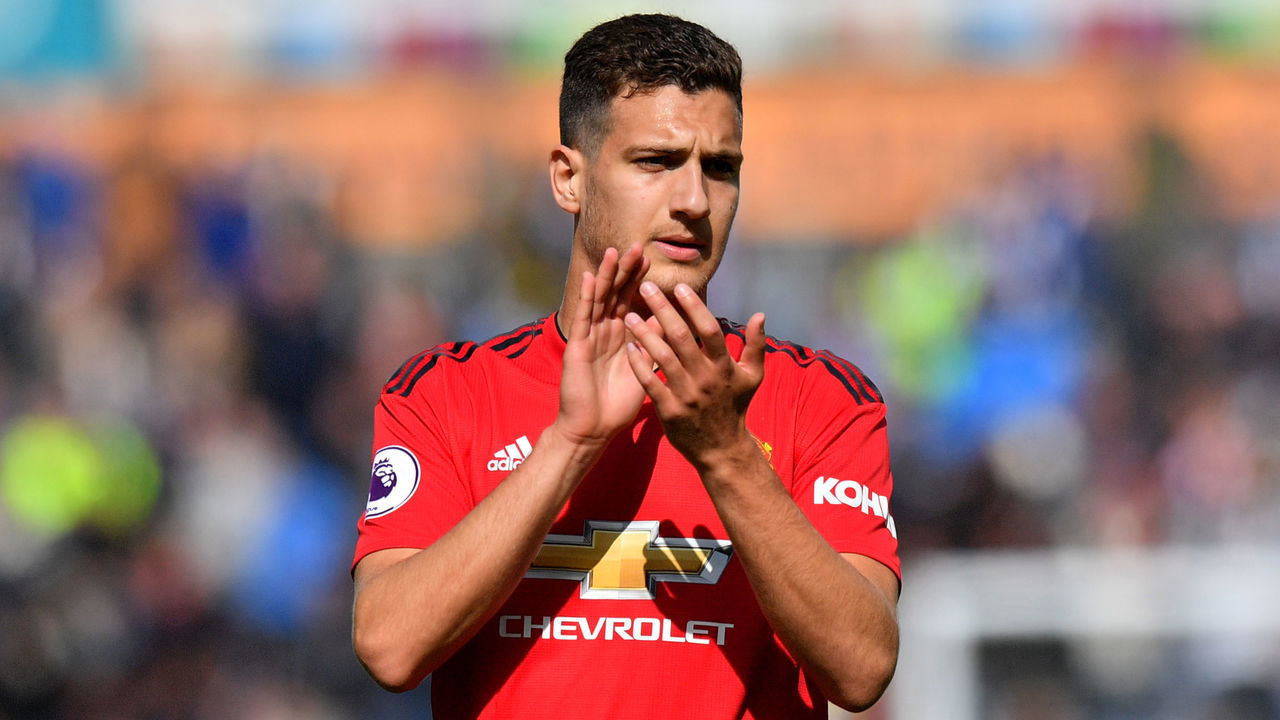 Manchester United's Diogo Dalot applauds the fans after the final whistle of the Premier League match at the John Smith's Stadium, Huddersfield.