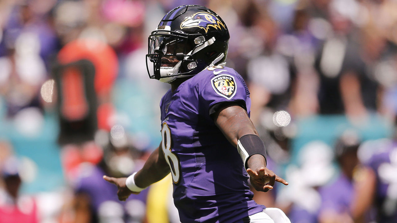 MIAMI, FLORIDA - SEPTEMBER 08: Lamar Jackson #8 of the Baltimore Ravens celebrates after throwing a 47-yard touchdown to Marquise Brown #15 (not pictured) during the first quarter against the Miami Dolphins at Hard Rock Stadium on September 08, 2019 in Miami, Florida.