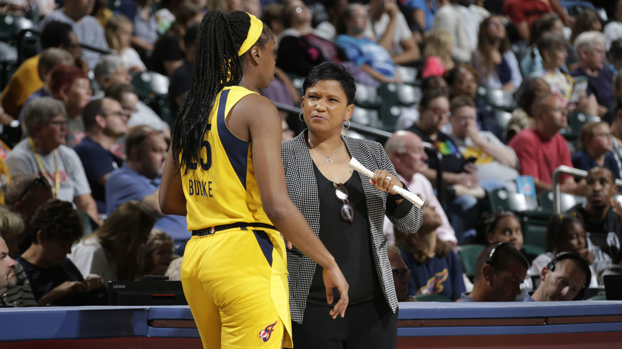 INDIANAPOLIS, IN - SEPTEMBER 8: Pokey Chatman talks with Kennedy Burke #25 of the Indiana Fever during the game against the Connecticut Sun on September 8, 2019 at the Bankers Life Fieldhouse in Indianapolis, Indiana. Mandatory Copyright Notice: Copyright 2019 NBAE