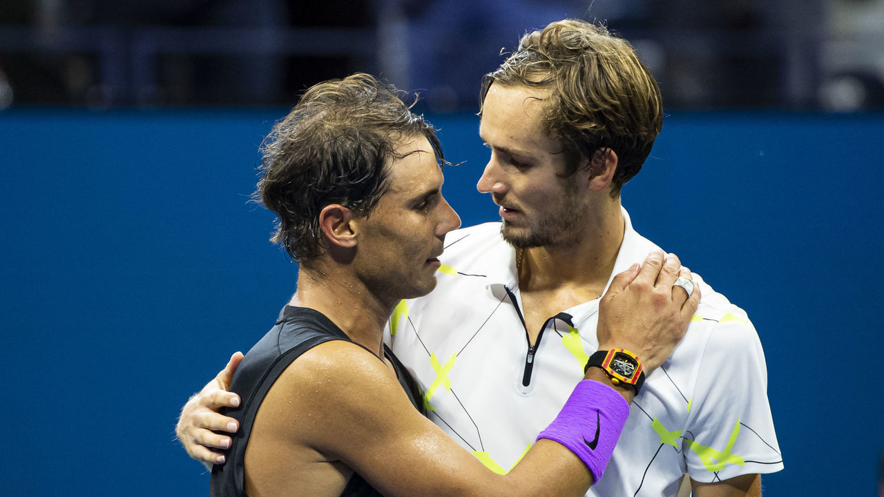 NEW YORK, NEW YORK - SEPTEMBER 08: Rafael Nadal of Spain embraces Daniil Medvedev of Russia after beating him 7-5 6-3 5-7 4-6 6-4 in the men's singles final at Arthur Ashe Stadium at the USTA Billie Jean King National Tennis Center on September 08, 2019 in New York City.