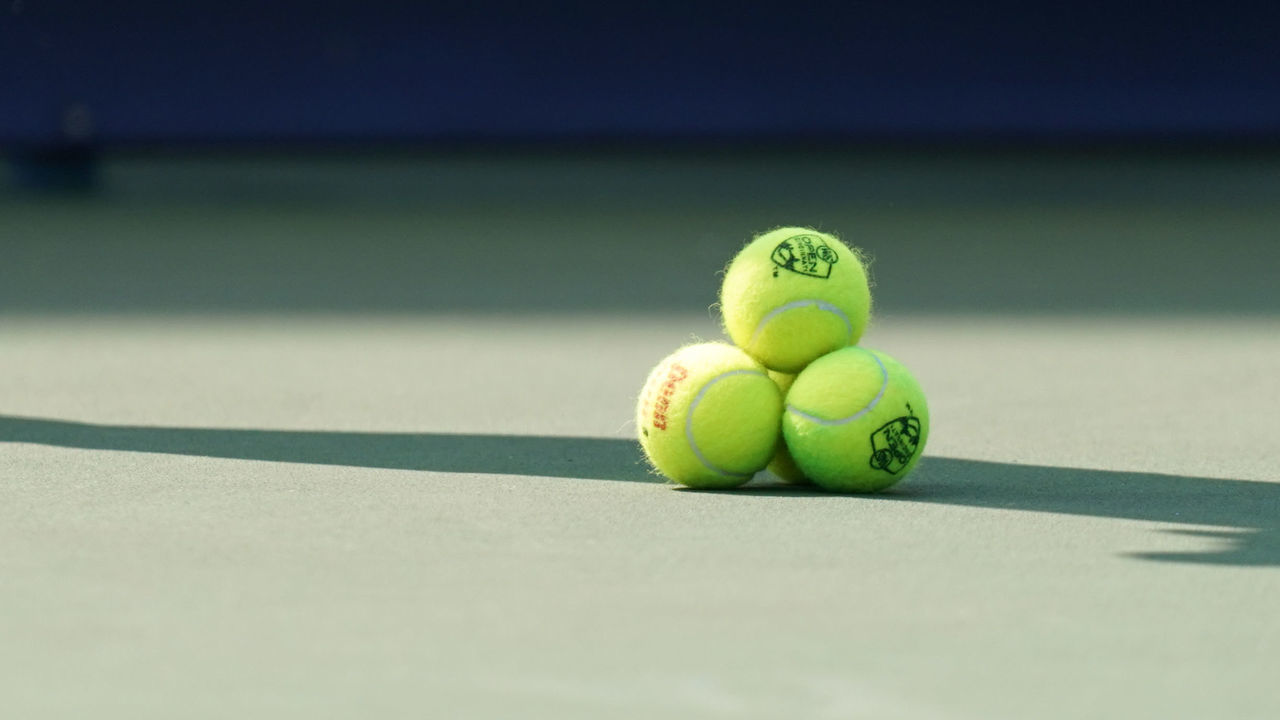 CINCINNATI, OH - AUGUST 16: New tennis balls sit on the court during the Western & Southern Open at Lindner Family Tennis Center on August 16th, 2019 in Mason, Ohio.
