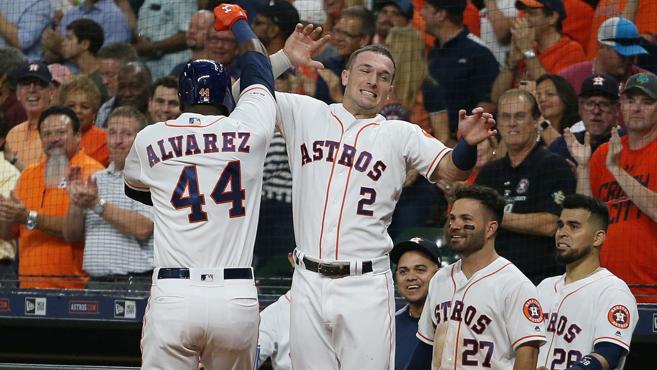 HOUSTON, TEXAS - SEPTEMBER 09: Yordan Alvarez #44 of the Houston Astros receives a high five from Alex Bregman #2 after hitting a home run in the first inning against the Oakland Athletics at Minute Maid Park on September 09, 2019 in Houston, Texas.