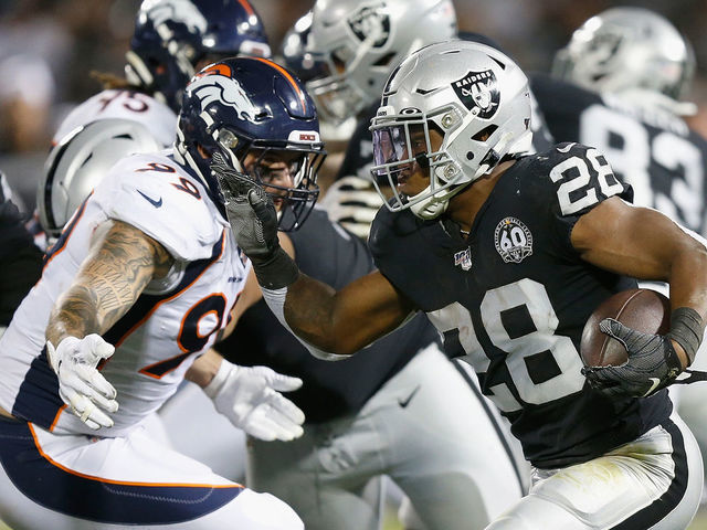 OAKLAND, CALIFORNIA - SEPTEMBER 09: Josh Jacobs #28 of the Oakland Raiders runs the ball in the second quarter against Adam Gotsis #99 of the Denver Broncos at RingCentral Coliseum on September 09, 2019 in Oakland, California.